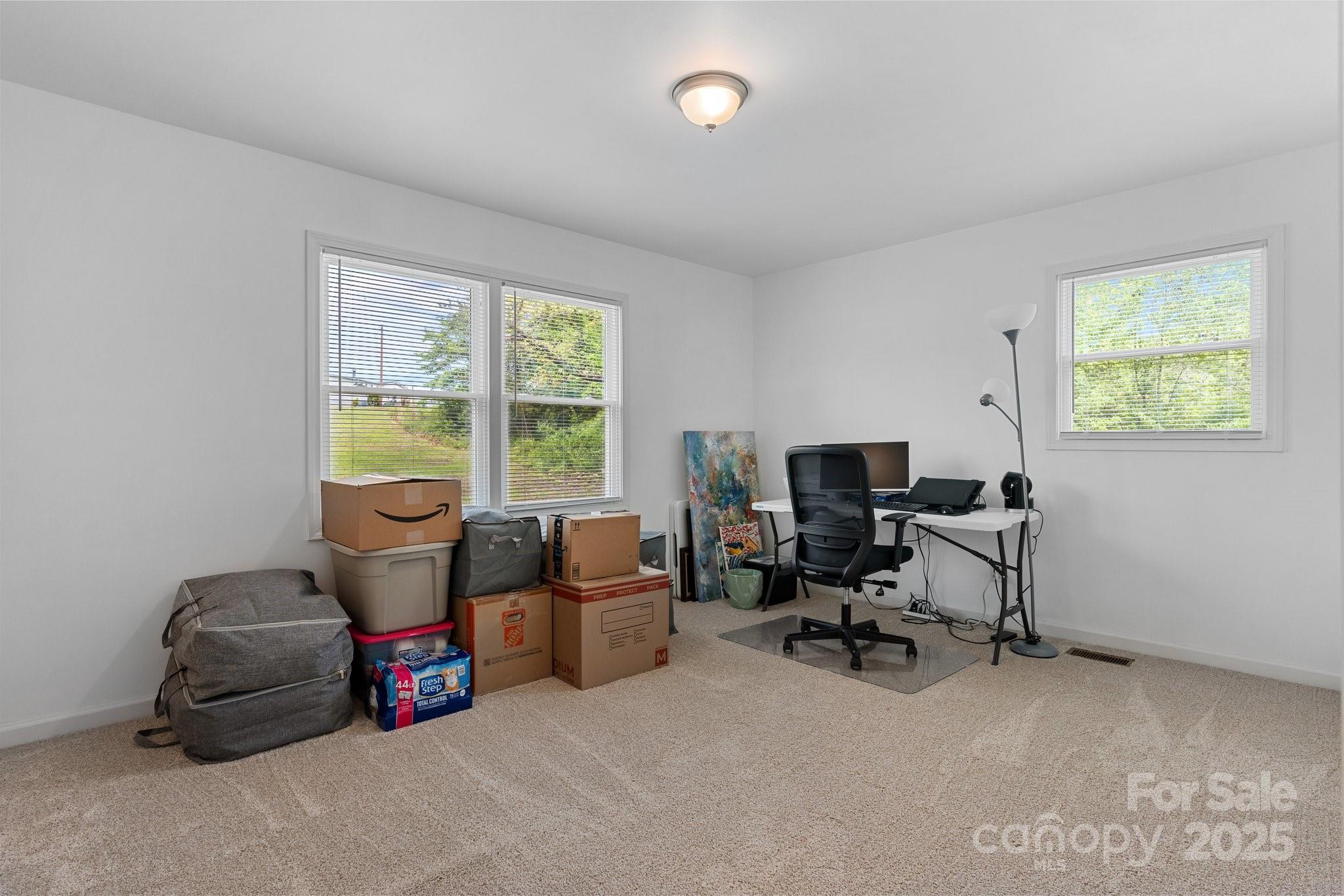 2473 Israel Chapel Road Connelly Springs, NC 28612 - Photo 14 of 37 a livingroom with workspace and a window