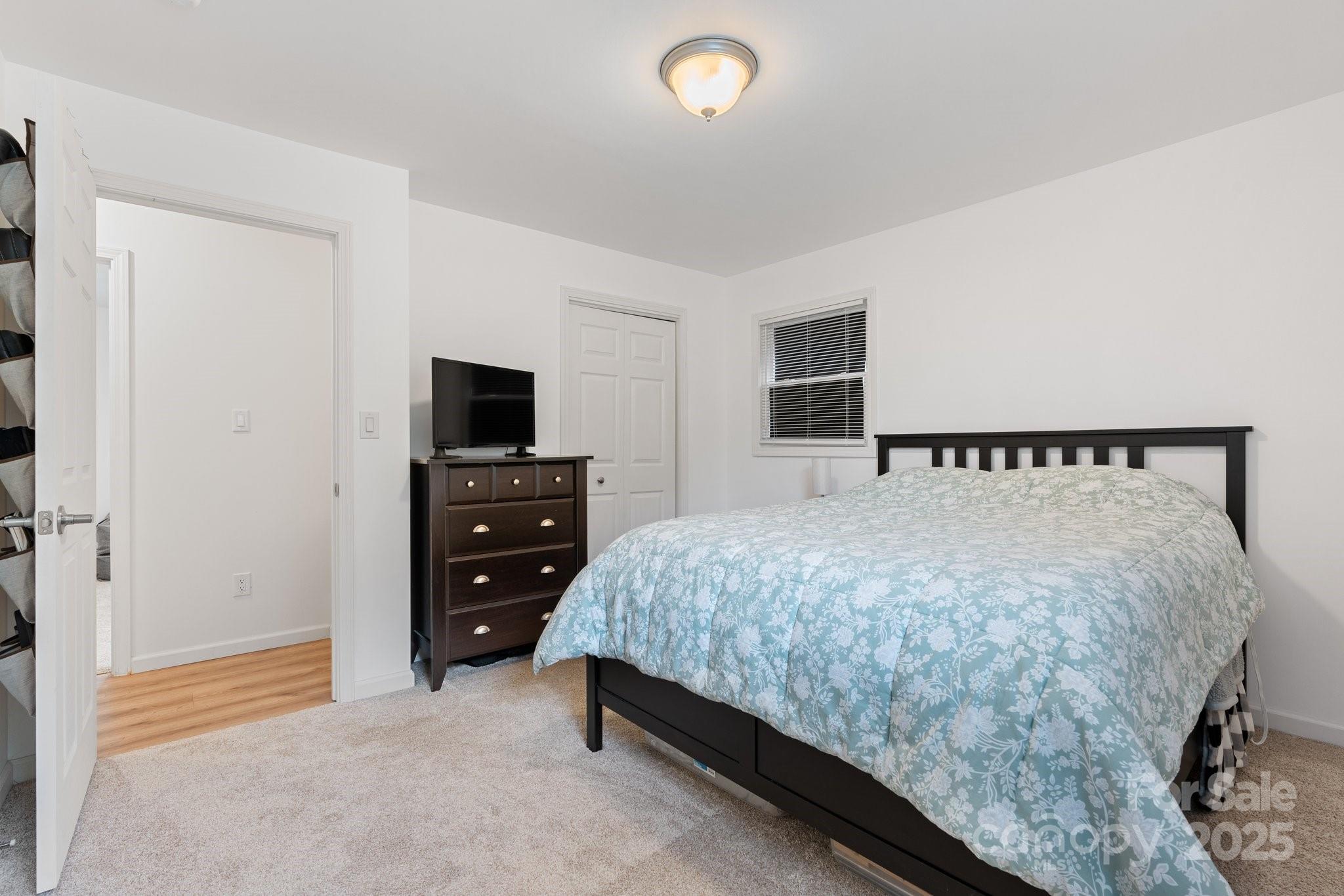 2473 Israel Chapel Road Connelly Springs, NC 28612 - Photo 17 of 37 a bedroom with a bed and a tv