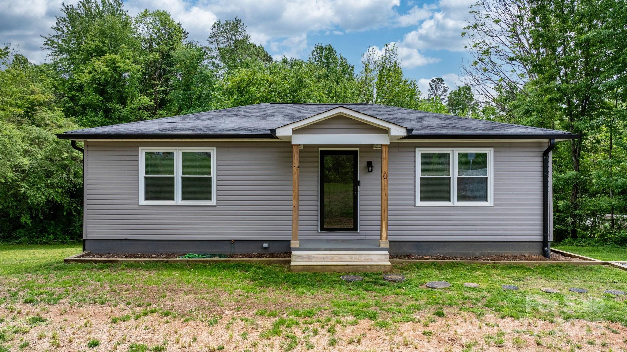 2473 Israel Chapel Road Connelly Springs, NC 28612 - Photo 21 of 37 a front view of a house with a yard