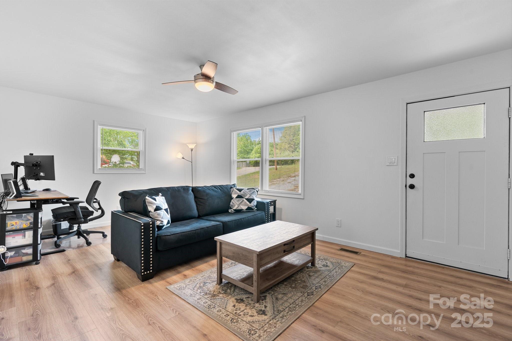 2473 Israel Chapel Road Connelly Springs, NC 28612 - Photo 6 of 37 a living room with furniture and a window
