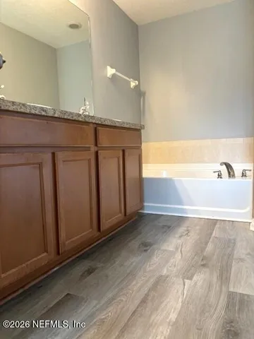 a view of a bathtub in a room