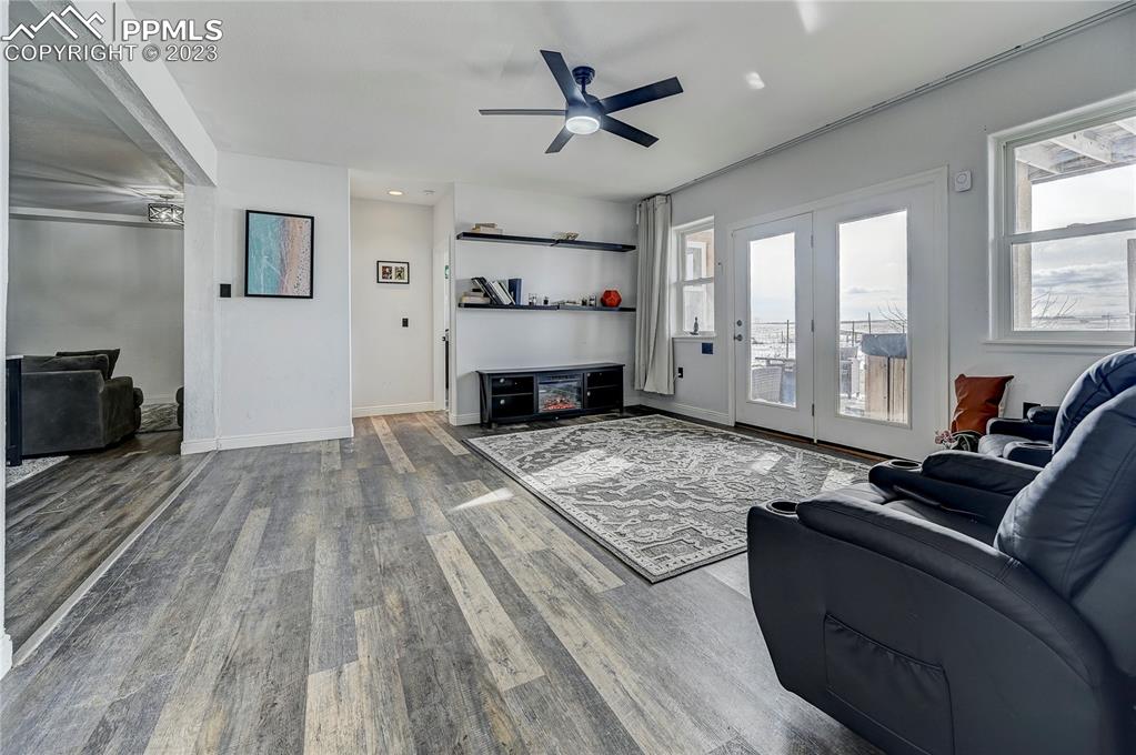 8640 Berridge Road Calhan, CO 80808 - Photo 28 of 50 a living room with furniture and a rug