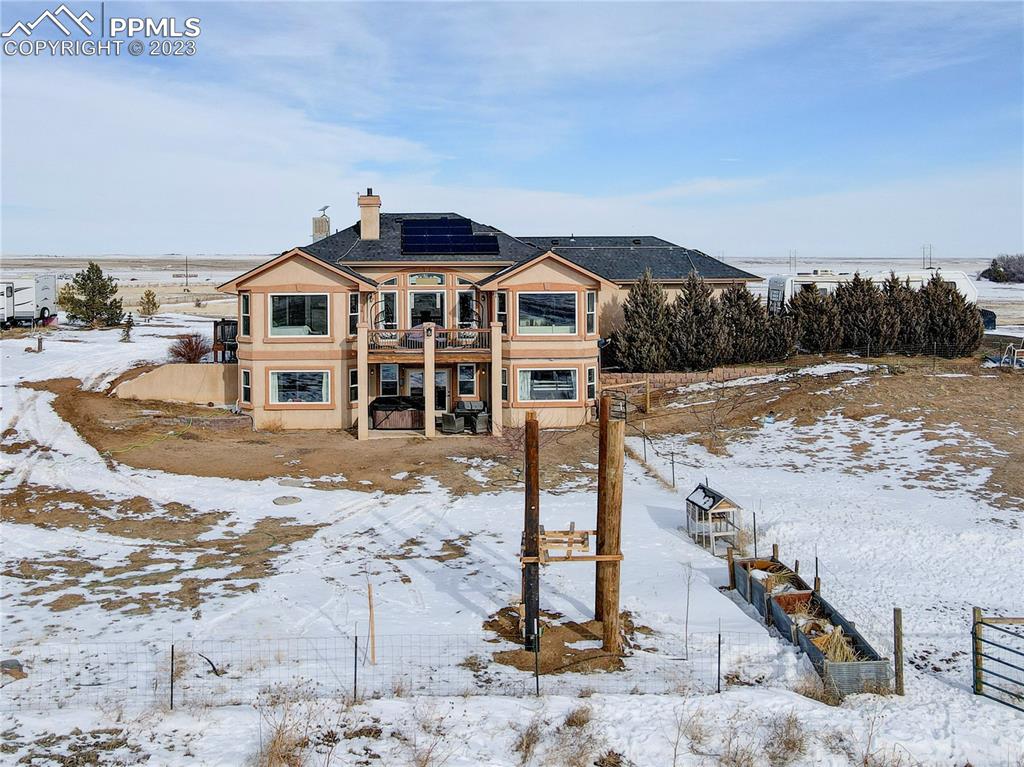 8640 Berridge Road Calhan, CO 80808 - Photo 41 of 50 a view of a house with a yard