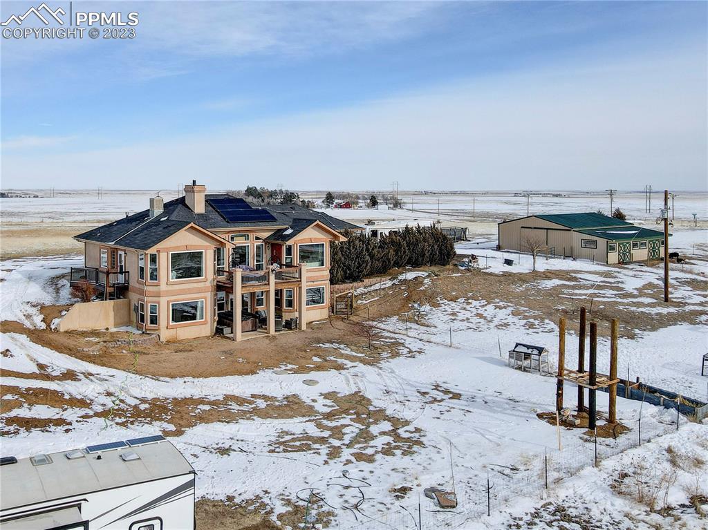 8640 Berridge Road Calhan, CO 80808 - Photo 42 of 50 a view of a big yard with an empty space