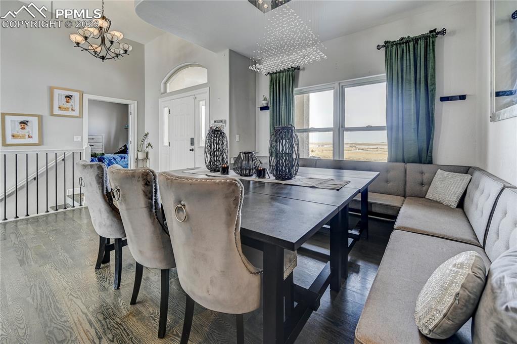 8640 Berridge Road Calhan, CO 80808 - Photo 10 of 50 a view of a dining room with furniture window and wooden floor