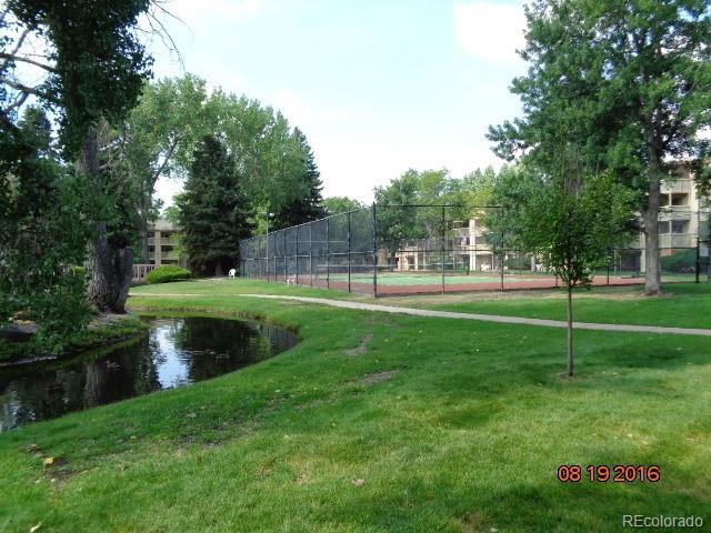 1302 South Parker Road, Unit 216 Denver, CO 80231 - Photo 8 of 13 a view of a park with large trees