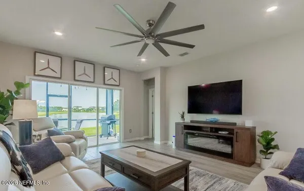 a kitchen with stainless steel appliances a stove sink and cabinets