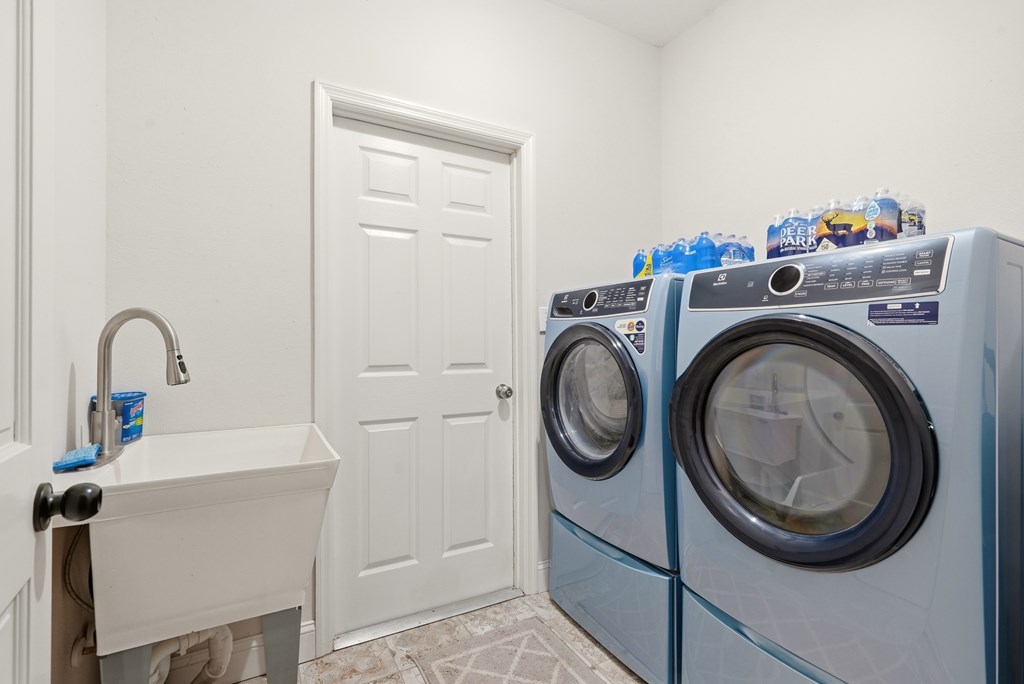 175 Crane Creek Road Young Harris, GA 30582 - Photo 29 of 40 a close view of utility and utility room with washer and dryer