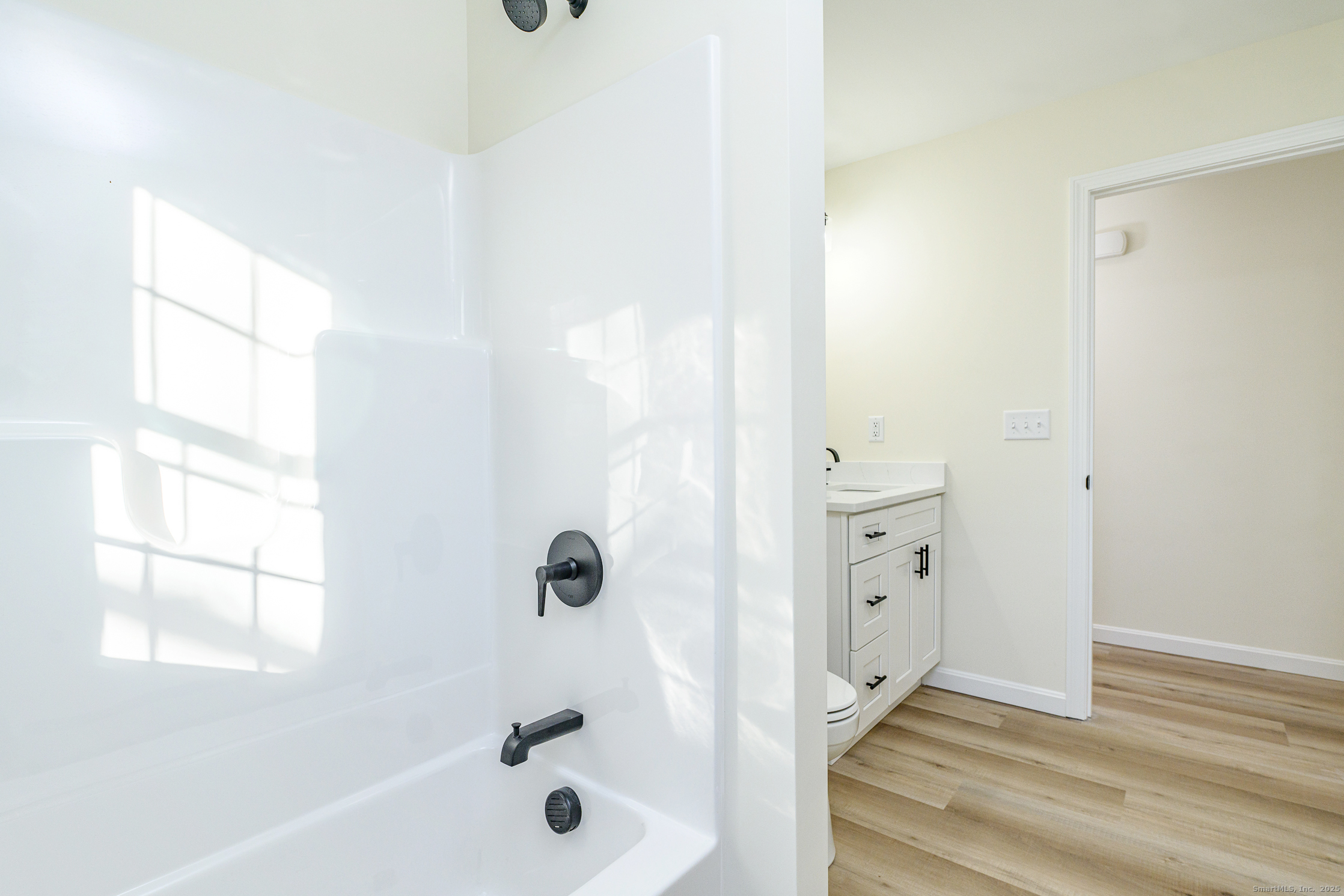 6 Prospect Street Putnam, CT 06260 - Photo 21 of 40 a bathroom with a bathtub and a shower