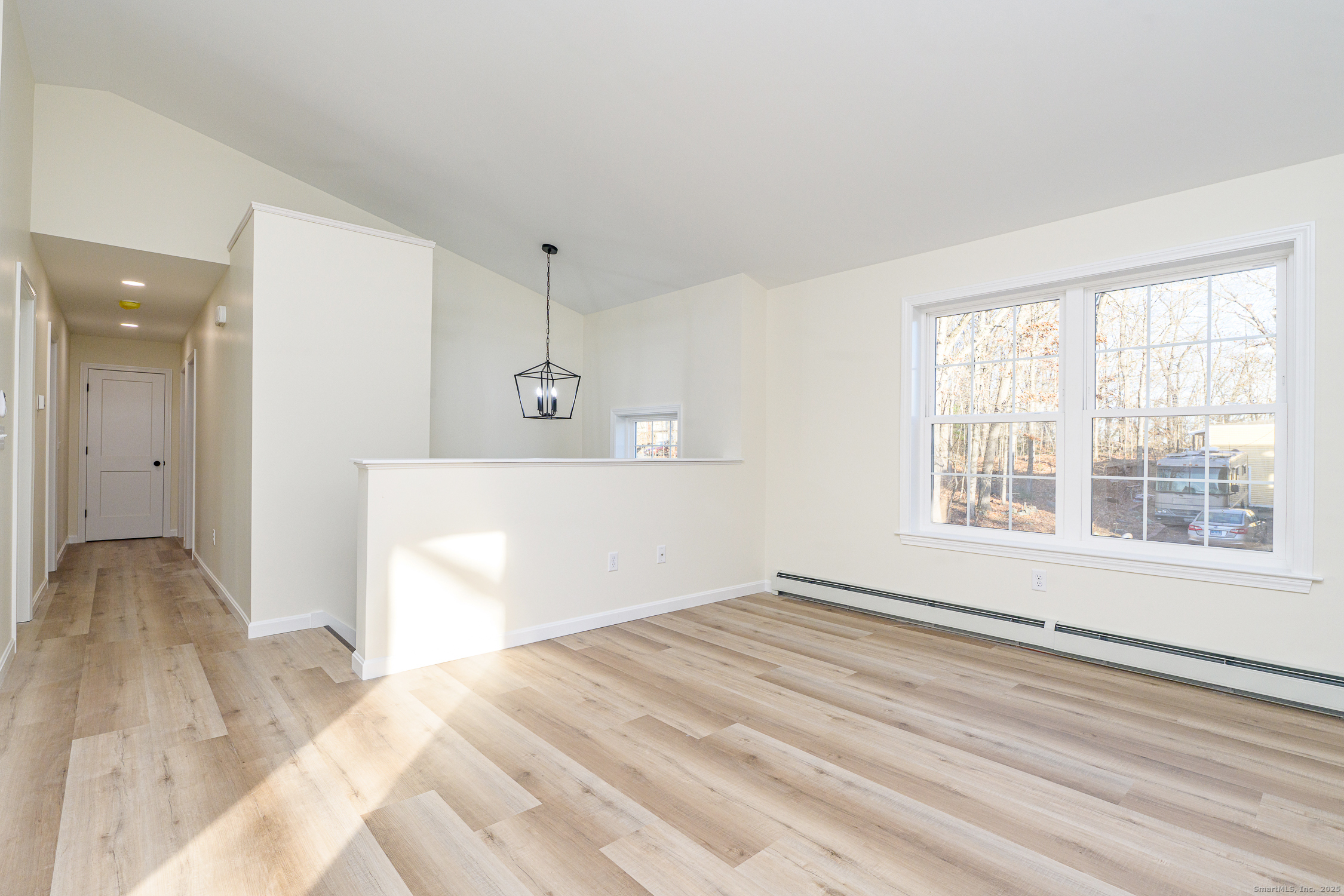 6 Prospect Street Putnam, CT 06260 - Photo 28 of 40 a view of an empty room with a window