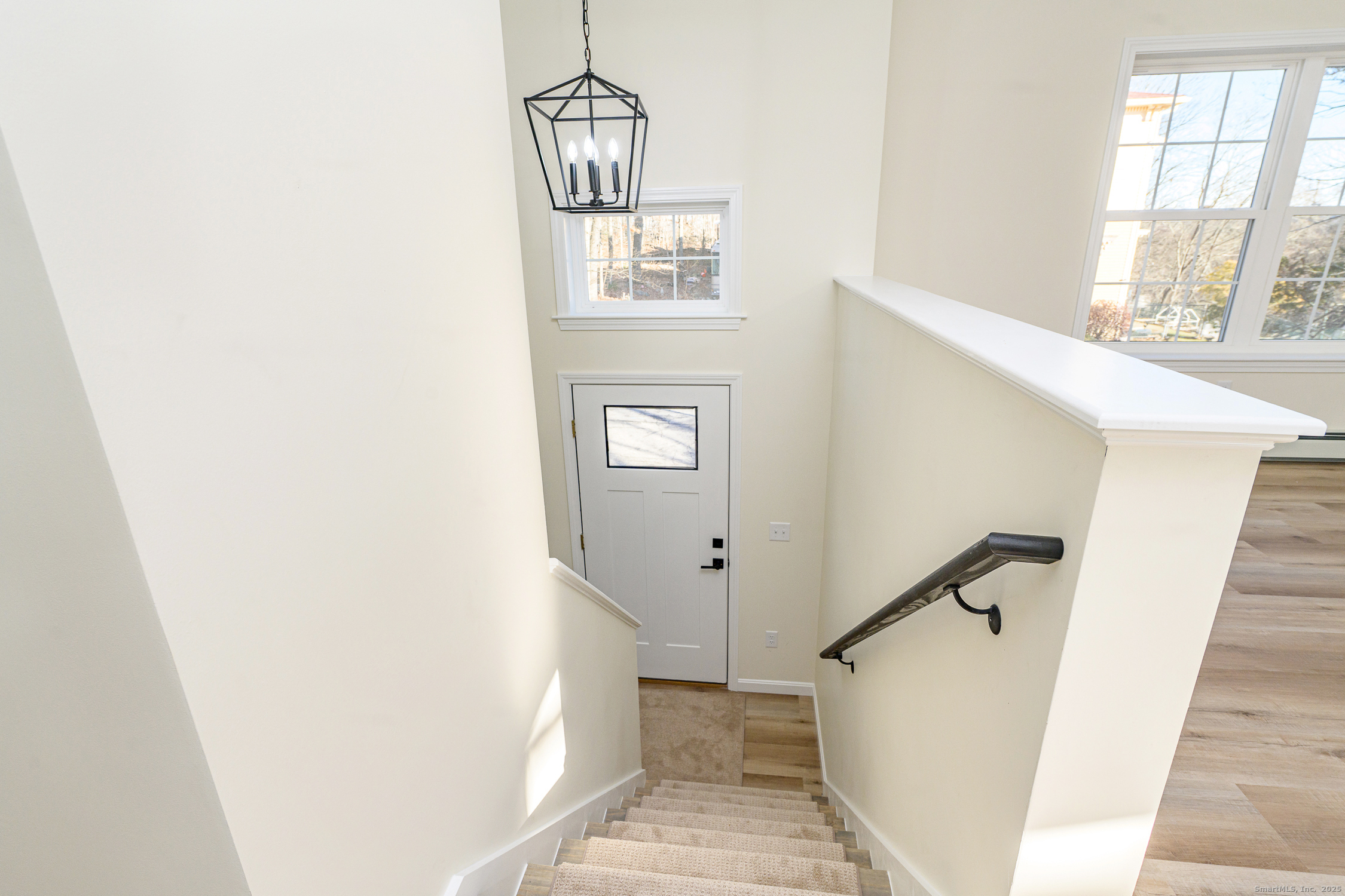 6 Prospect Street Putnam, CT 06260 - Photo 29 of 40 a view of a hallway with windows and entryway