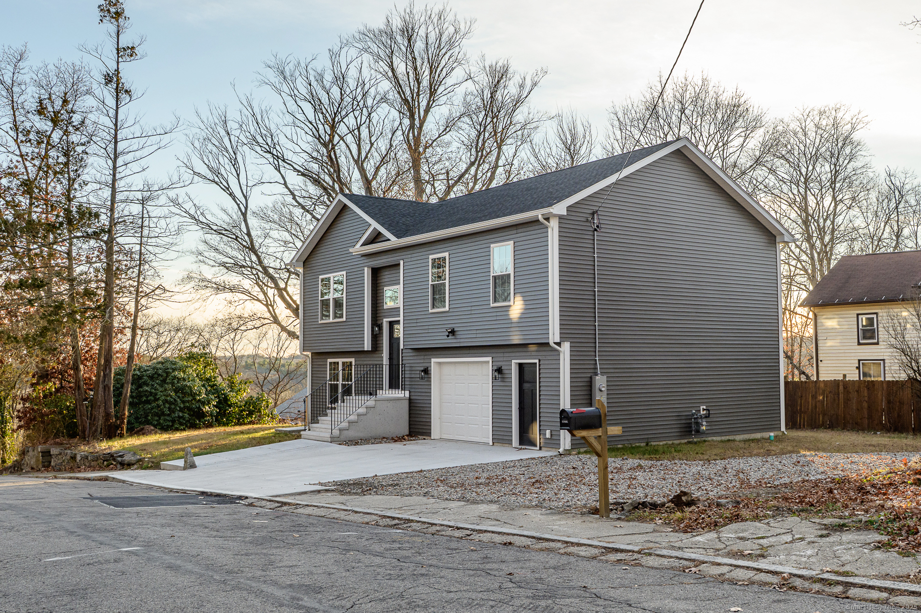 6 Prospect Street Putnam, CT 06260 - Photo 36 of 40 a view of a house with a yard