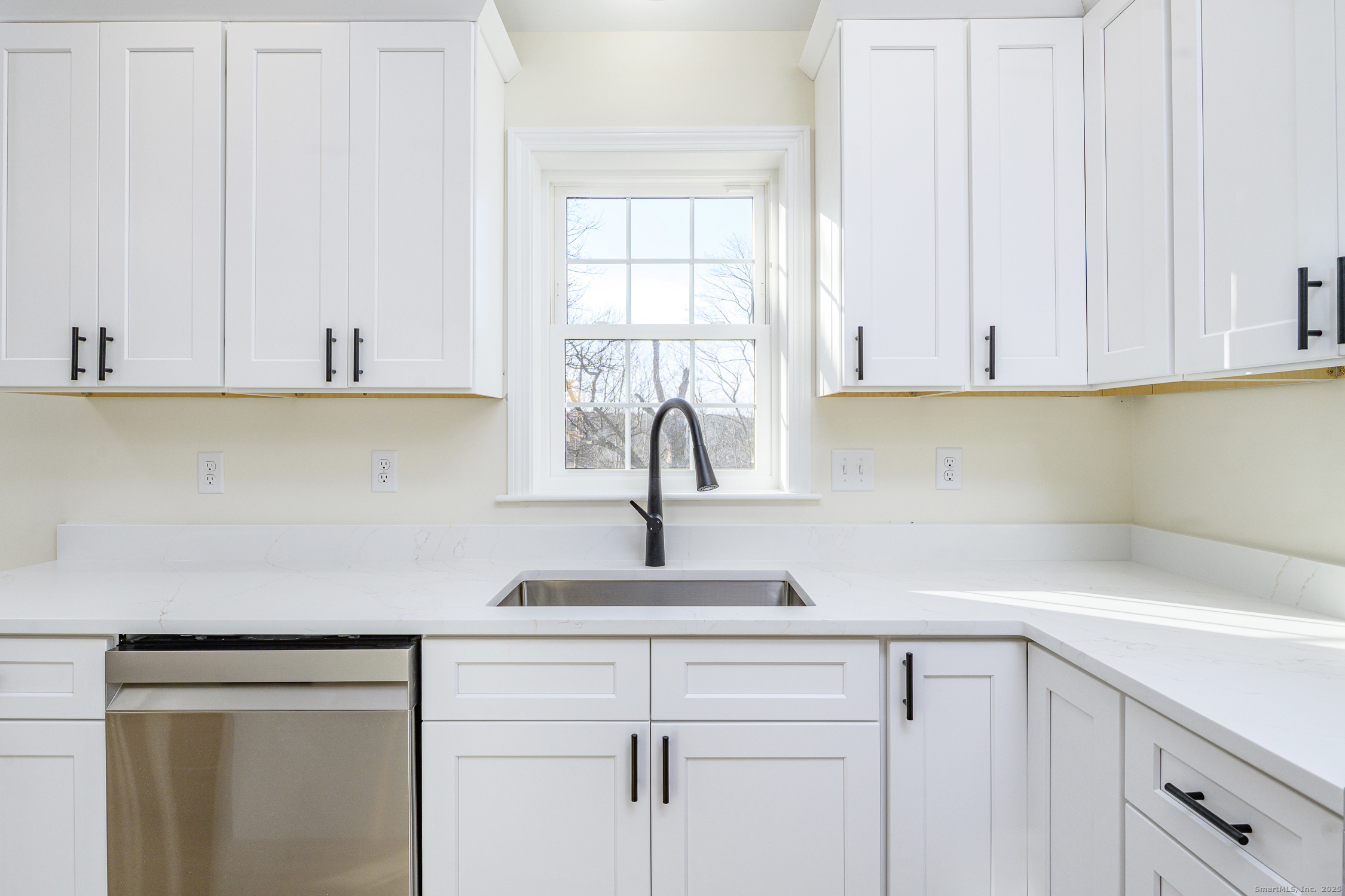 6 Prospect Street Putnam, CT 06260 - Photo 10 of 40 a kitchen with a sink and cabinets