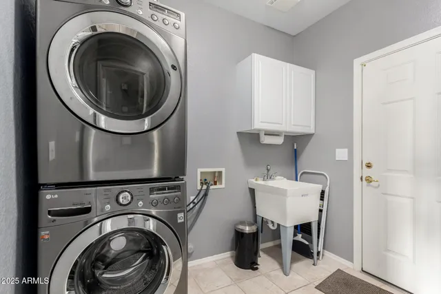 a view of a room with washer and dryer