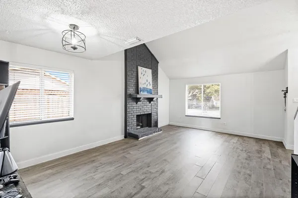 a kitchen with sink cabinets and window