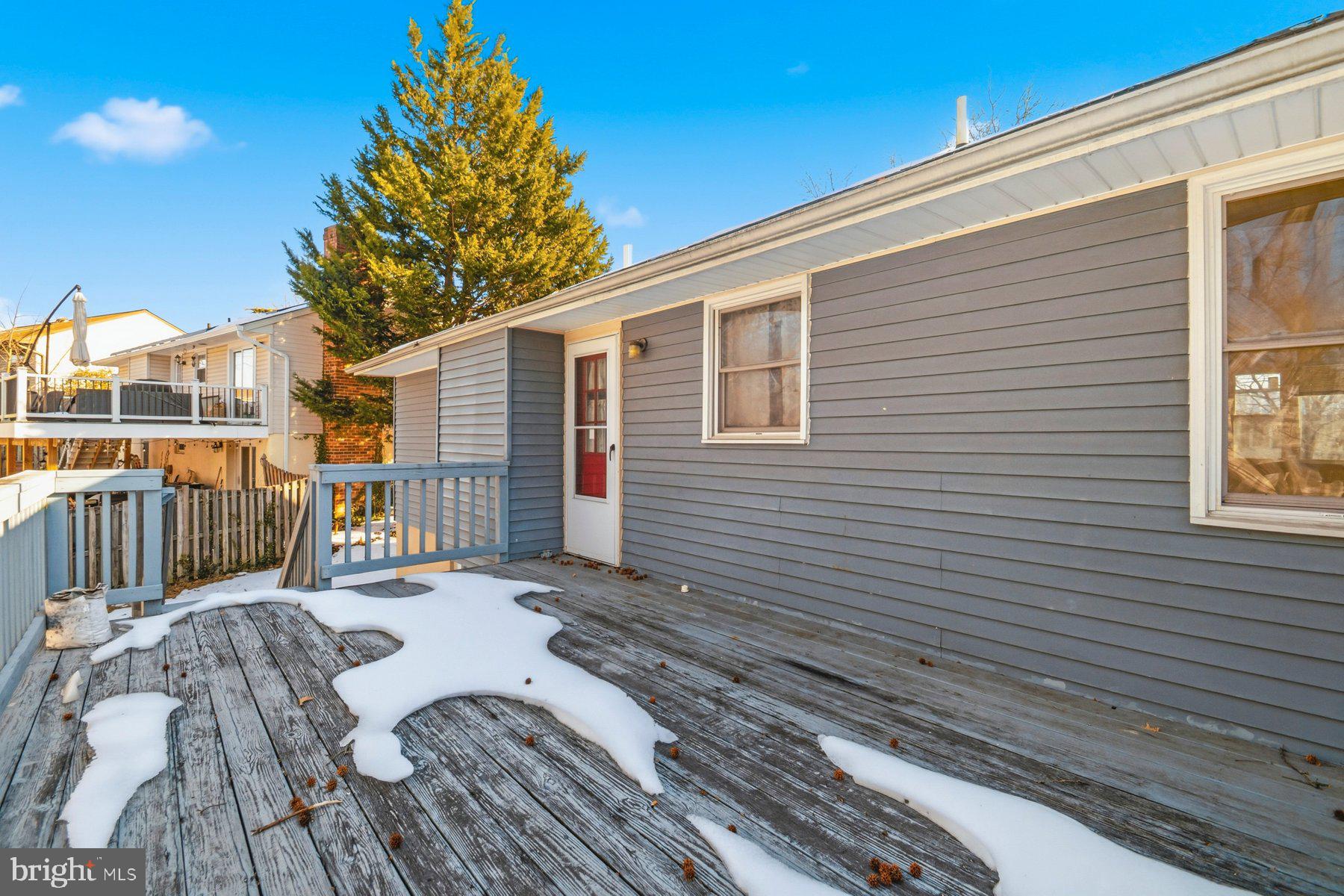 7526 Lemon Tree Court Hanover, MD 21076 - Photo 11 of 27 a view of a house with a patio