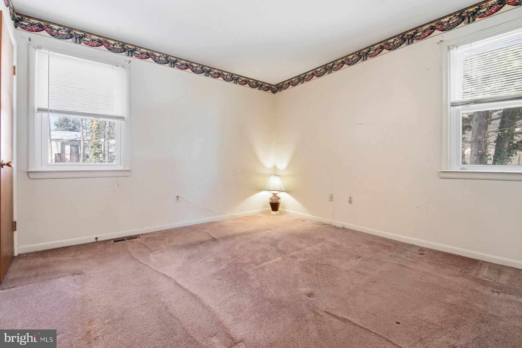 7526 Lemon Tree Court Hanover, MD 21076 - Photo 15 of 27 a view of a room with window and cabinet
