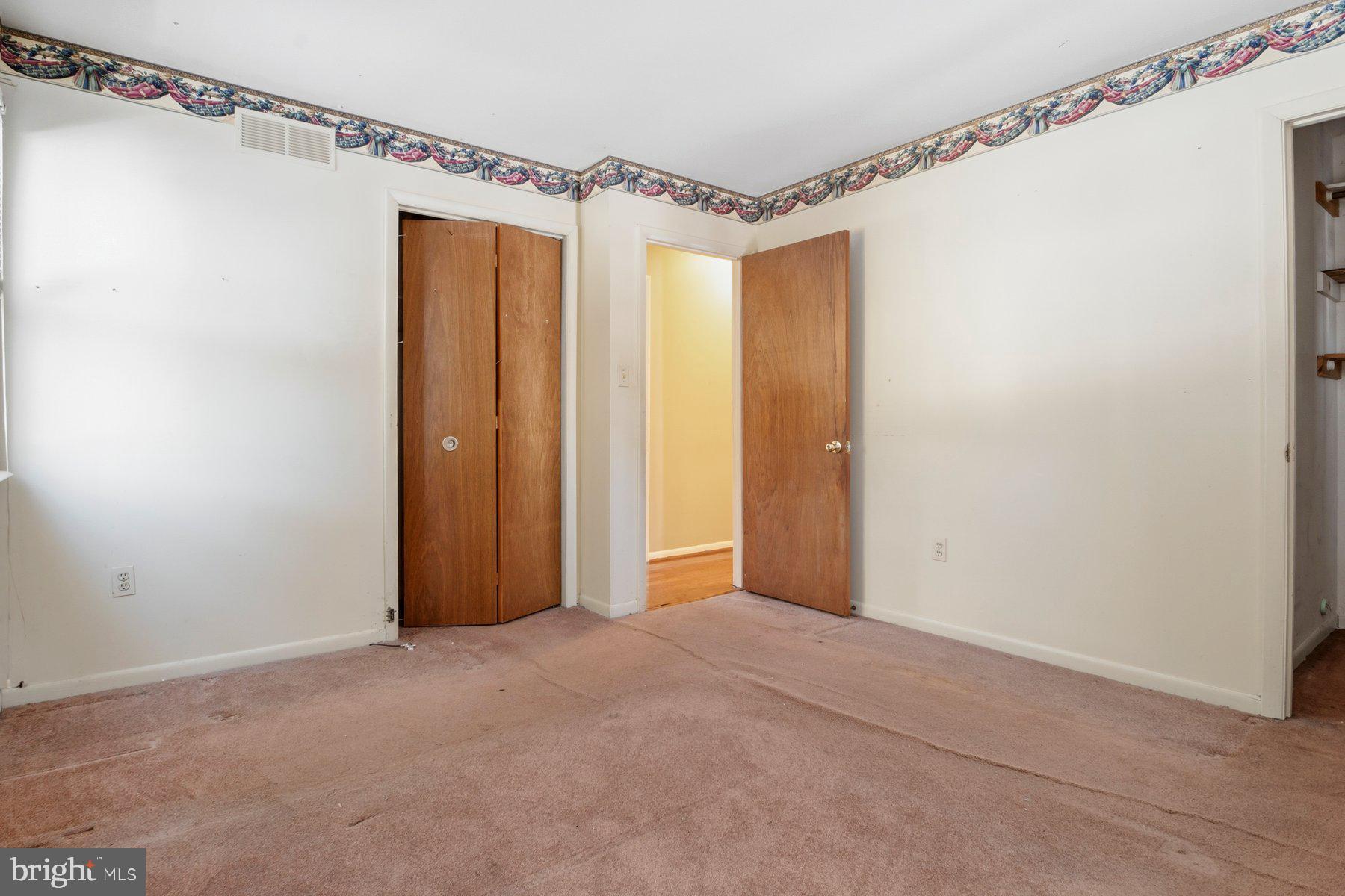 7526 Lemon Tree Court Hanover, MD 21076 - Photo 16 of 27 a view of an empty room