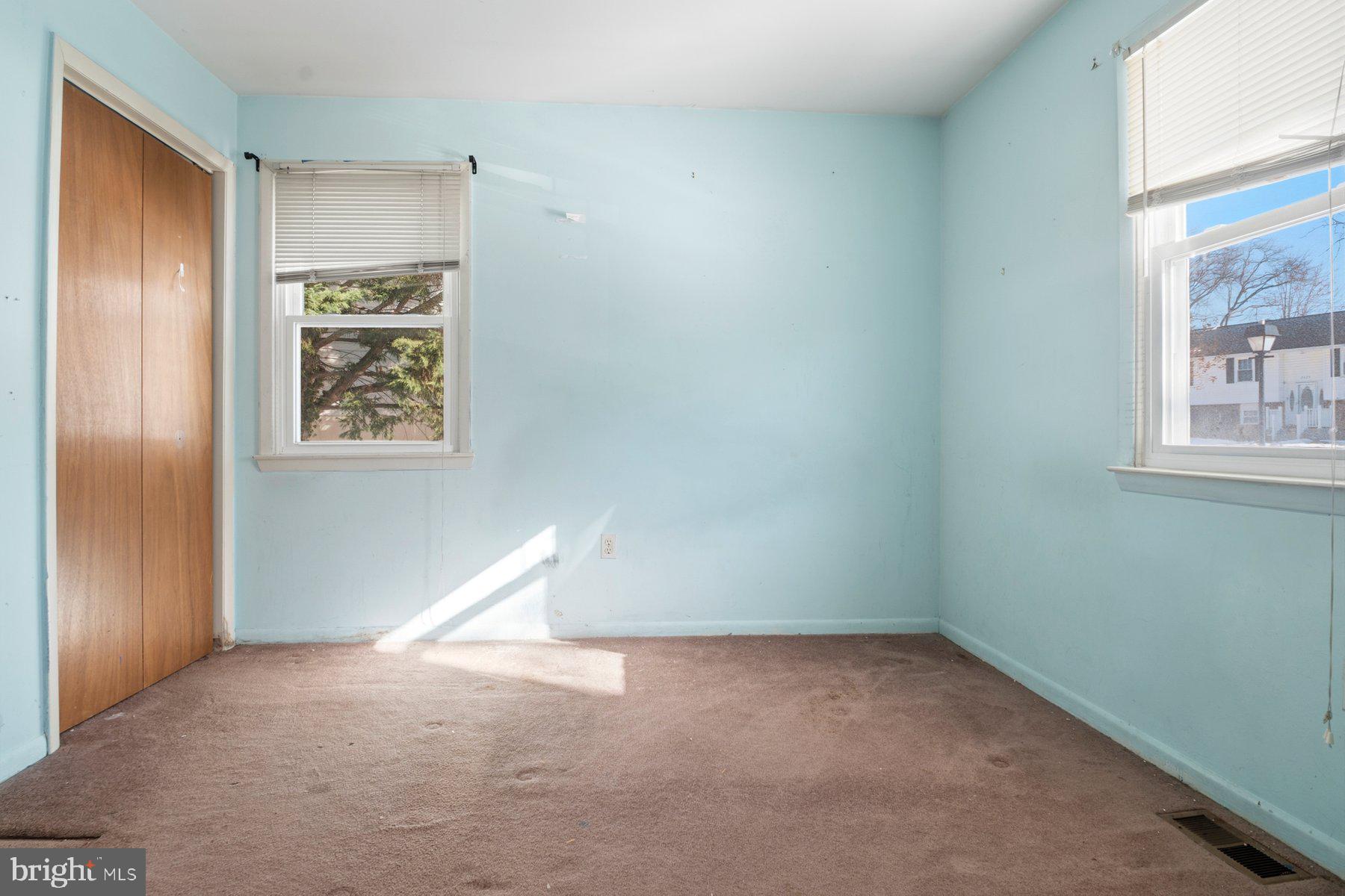 7526 Lemon Tree Court Hanover, MD 21076 - Photo 17 of 27 an empty room with windows