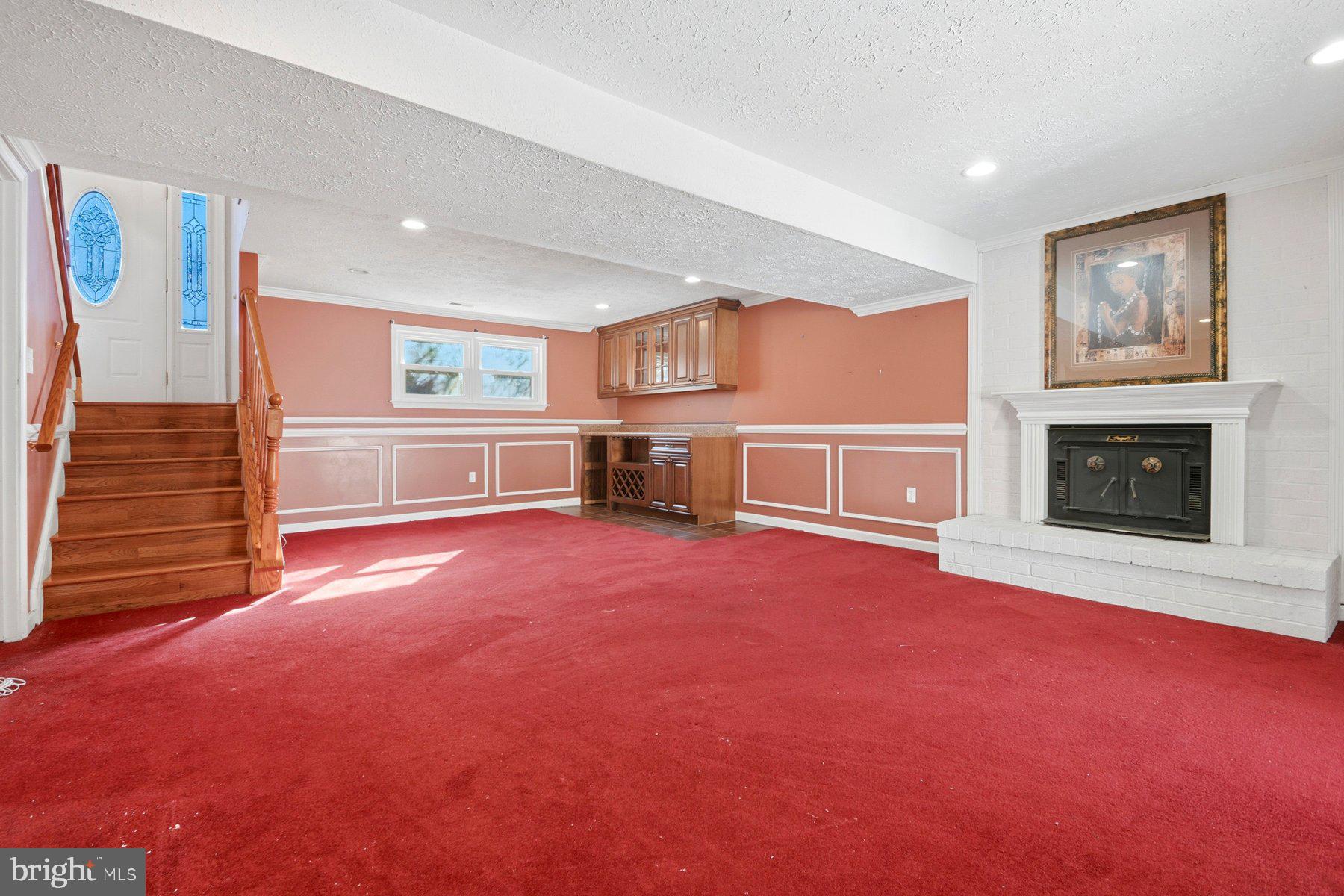 7526 Lemon Tree Court Hanover, MD 21076 - Photo 21 of 27 a view of livingroom with furniture and fireplace