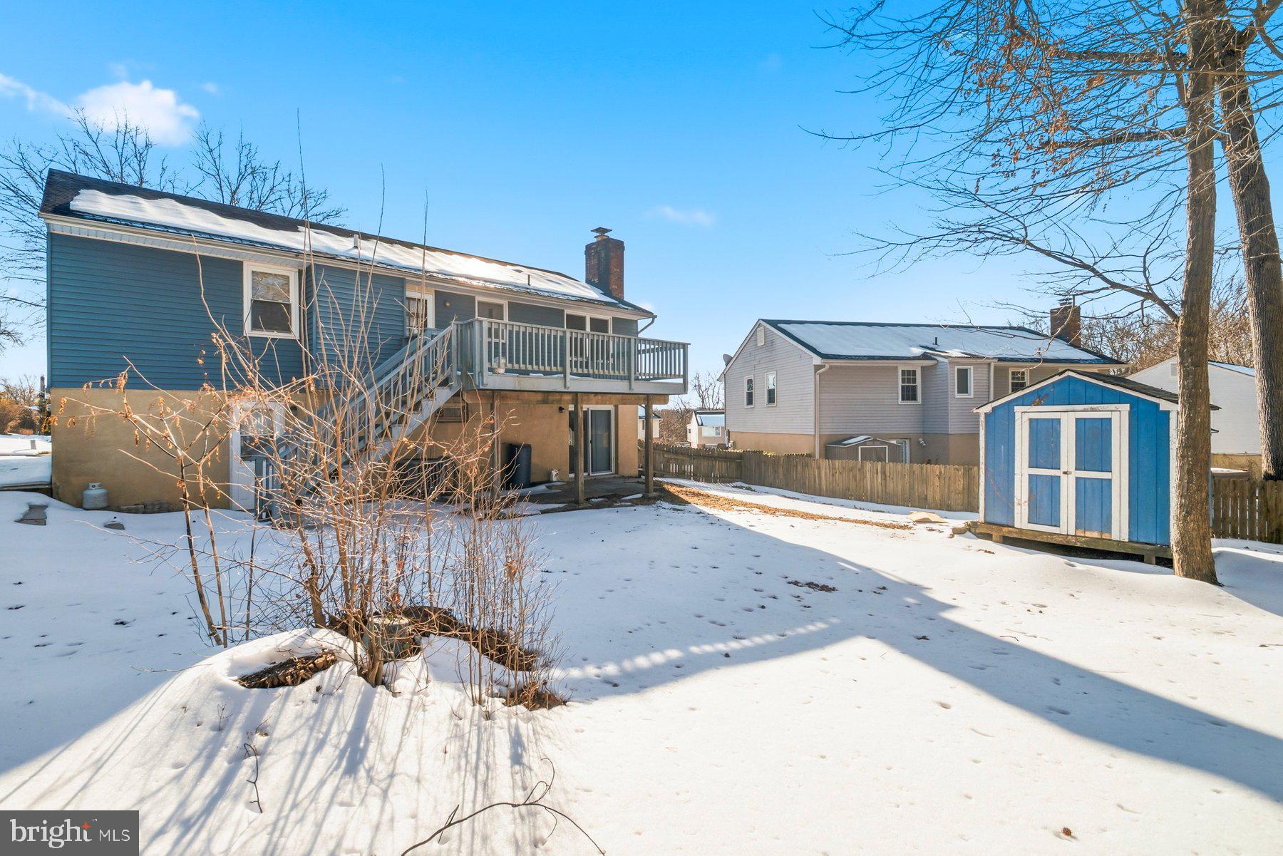 7526 Lemon Tree Court Hanover, MD 21076 - Photo 26 of 27 a view of a house with a yard