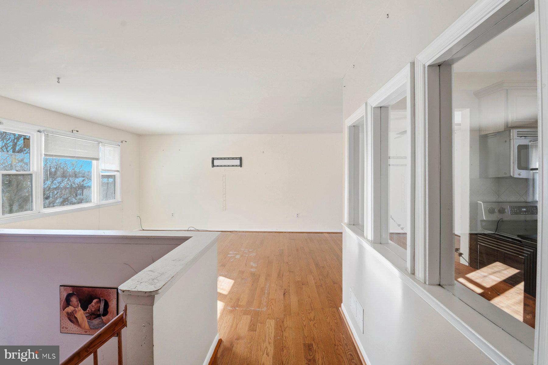 7526 Lemon Tree Court Hanover, MD 21076 - Photo 10 of 27 a view of an empty room with a window