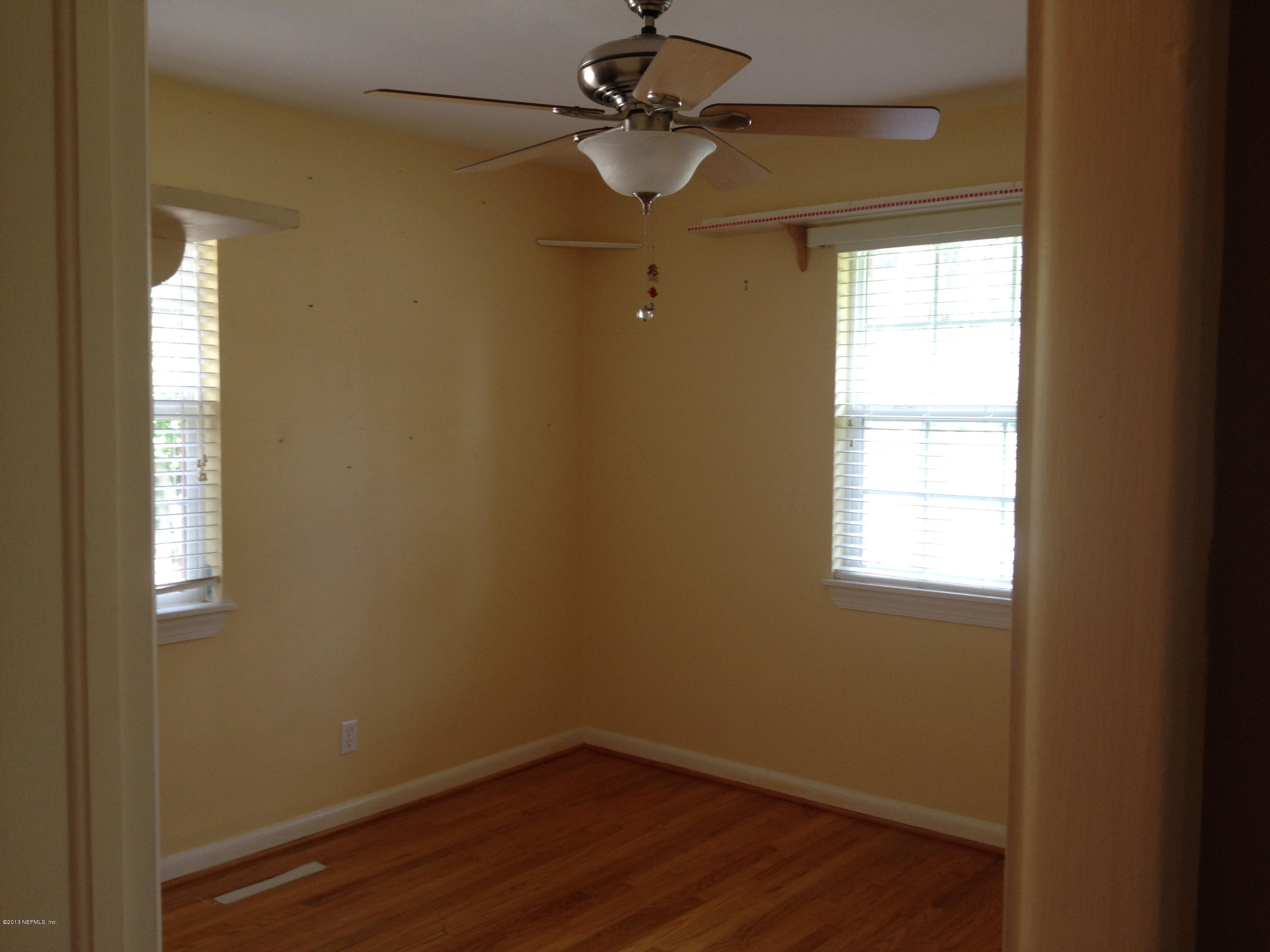 7236 Coligny Road Jacksonville, FL 32217 - Photo 35 of 45 a small space with a window and wooden floor
