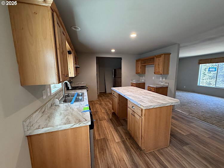 16125 Hawks Lair Road La Pine, OR 97739 - Photo 11 of 35 a kitchen with a stove and a sink