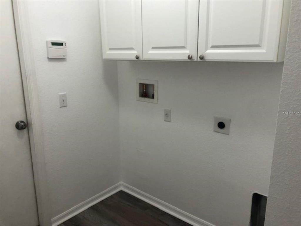 4955 Southwest 129th Place Ocala, FL 34473 - Photo 8 of 19 a bathroom with a sink