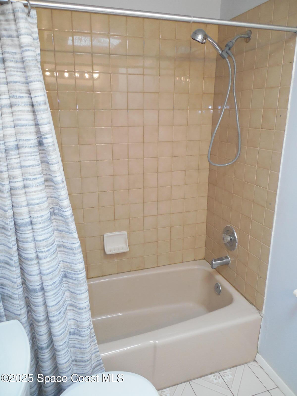 345 Ocean View Lane Indialantic, FL 32903 - Photo 26 of 31 a bathroom with a bathtub