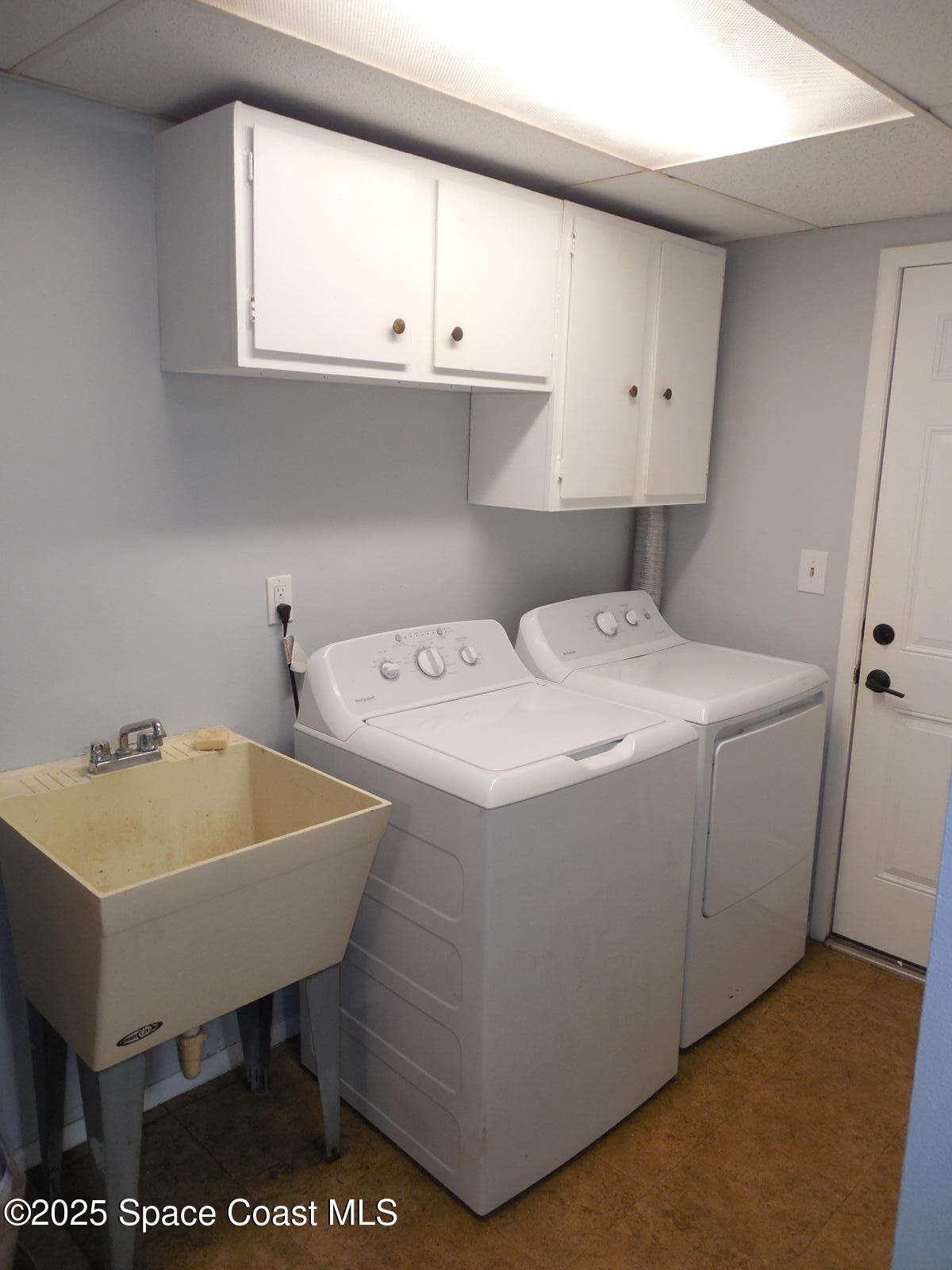 345 Ocean View Lane Indialantic, FL 32903 - Photo 8 of 31 a utility room with dryer and washer