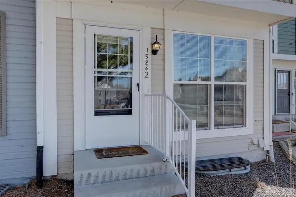 a front view of a house with a window