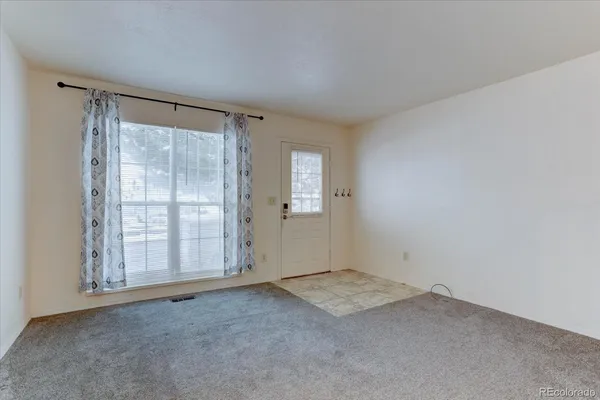 an empty room with windows