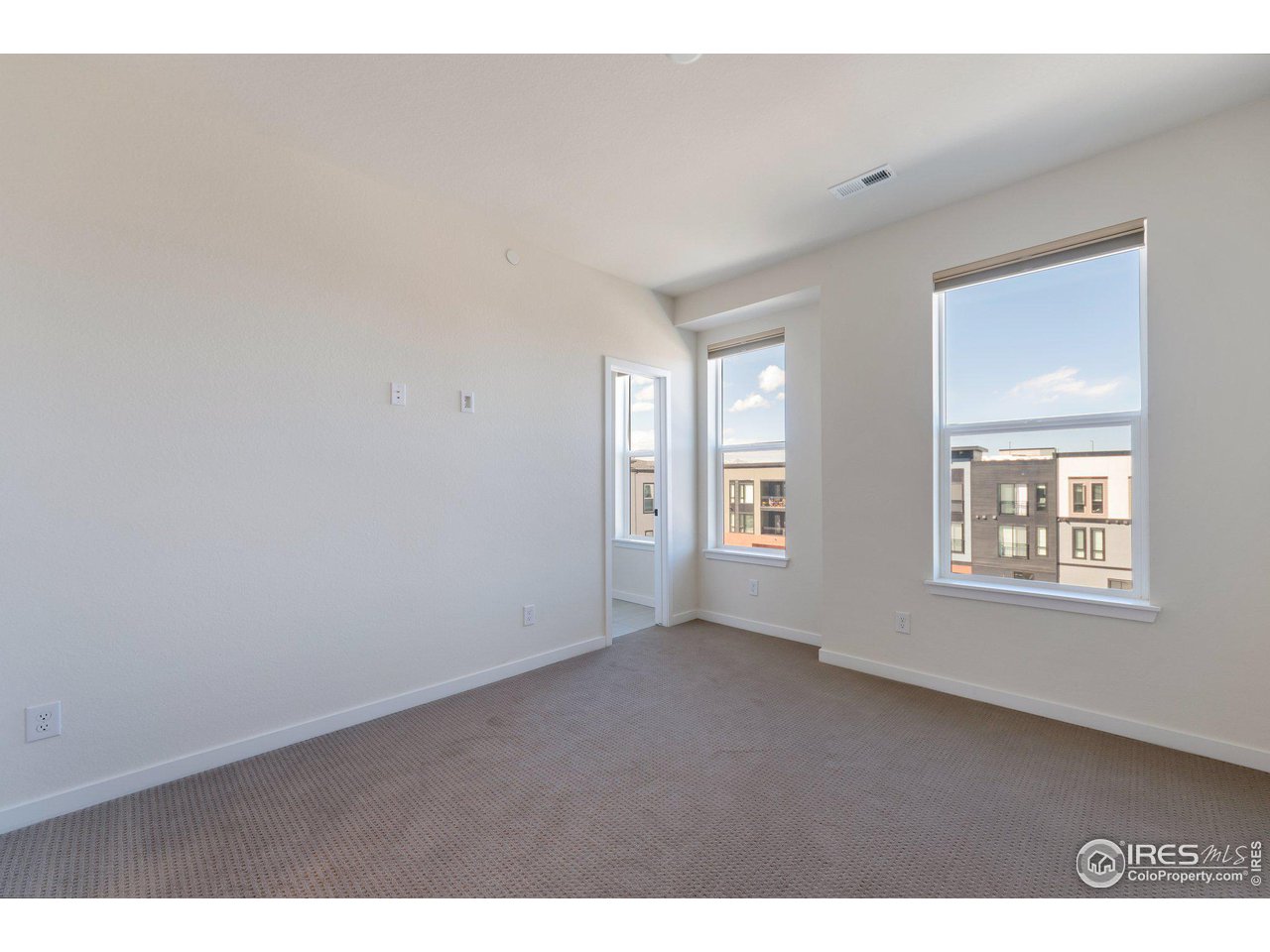 358 Promenade Drive Superior, CO 80027 - Photo 11 of 32 a view of an empty room with a window
