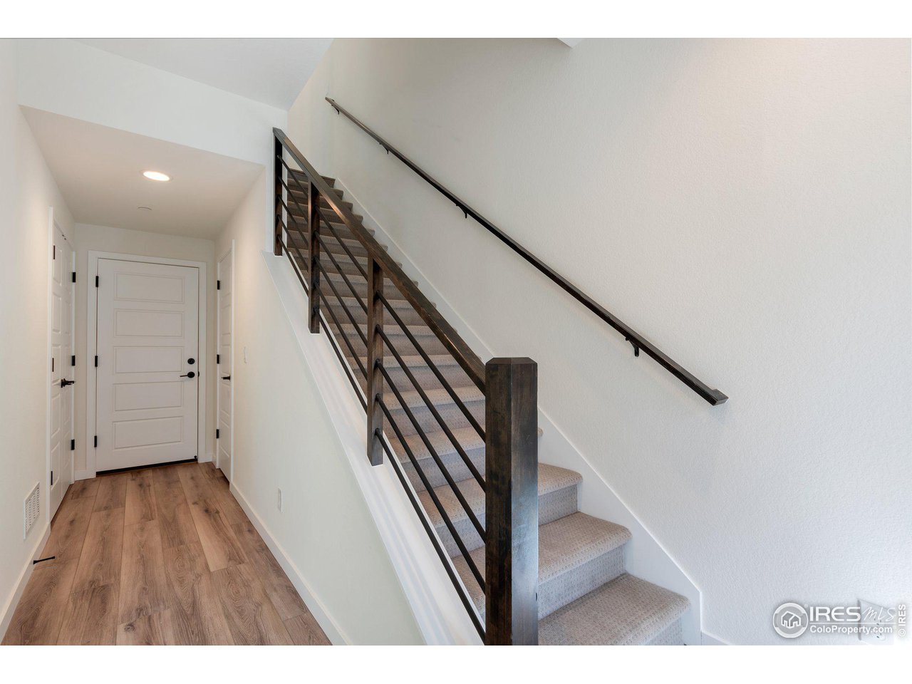 358 Promenade Drive Superior, CO 80027 - Photo 16 of 32 a view of entryway with wooden floor
