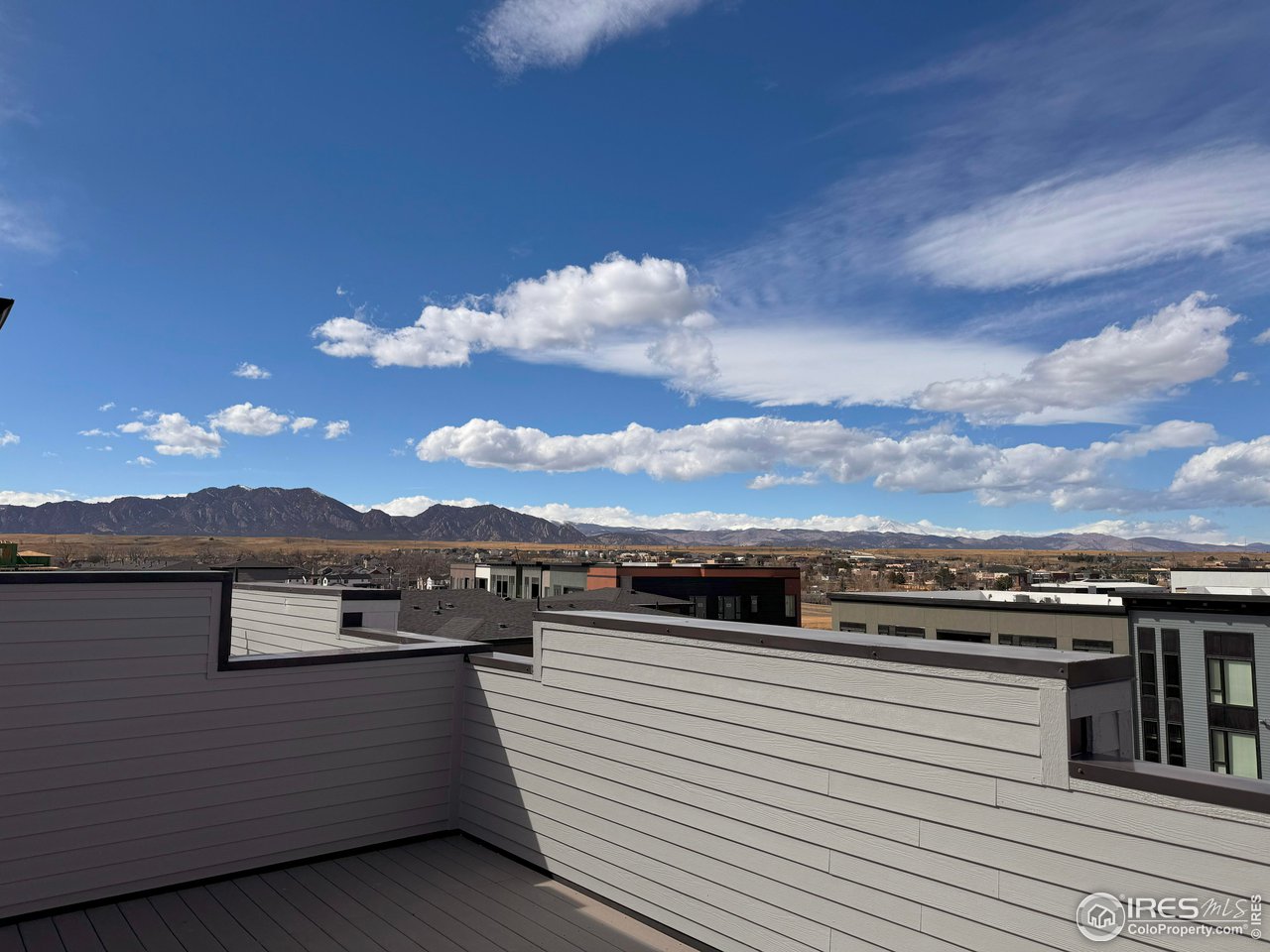 358 Promenade Drive Superior, CO 80027 - Photo 21 of 32 a view of a terrace with a mountain
