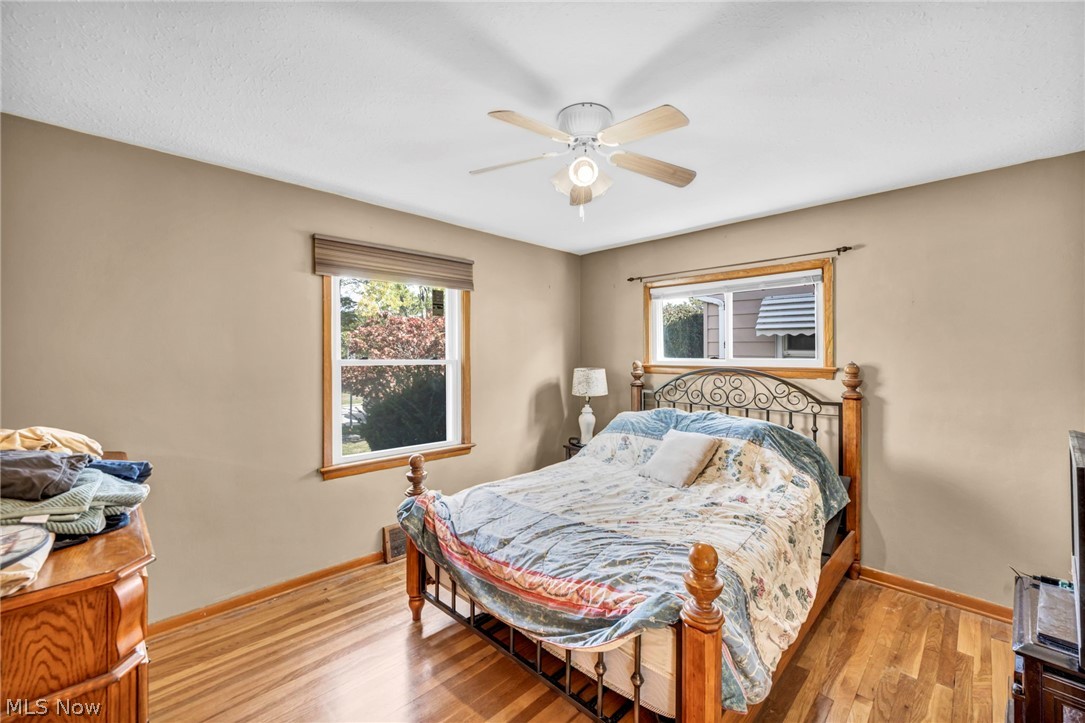 30002 Barjode Road Willowick, OH 44095 - Photo 20 of 33 Bedroom featuring light wood-style floors and ceiling fan