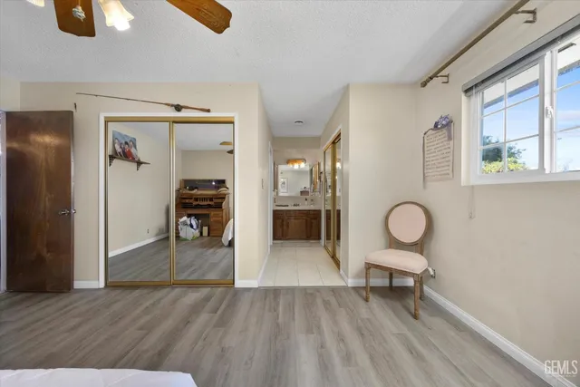 a view of livingroom and dining room with wooden floor