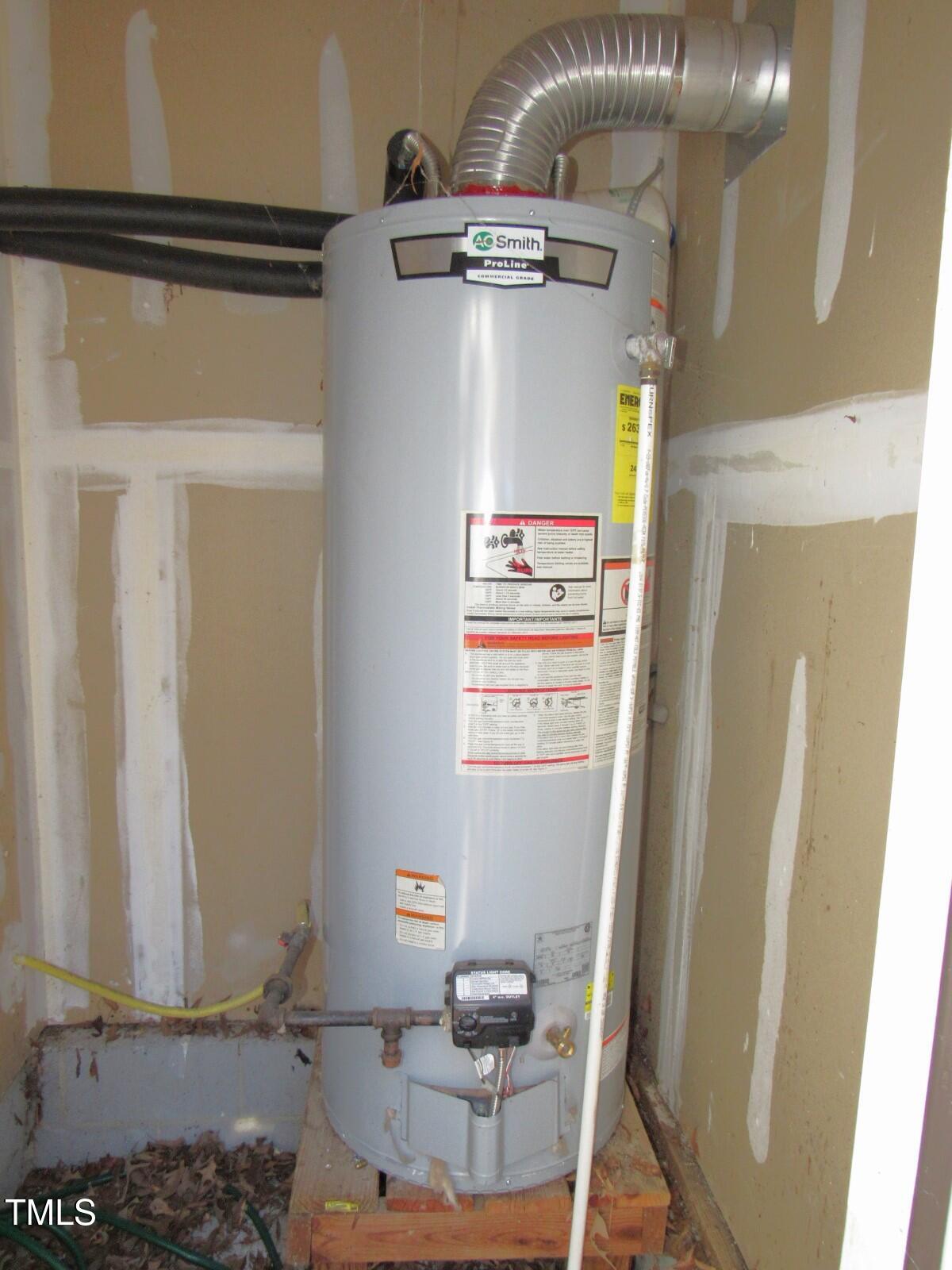 1313 Swingline Way Raleigh, NC 27610 - Photo 17 of 26 Water heater storage