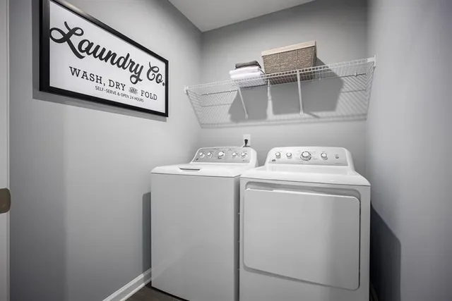 a utility room with dryer and washer