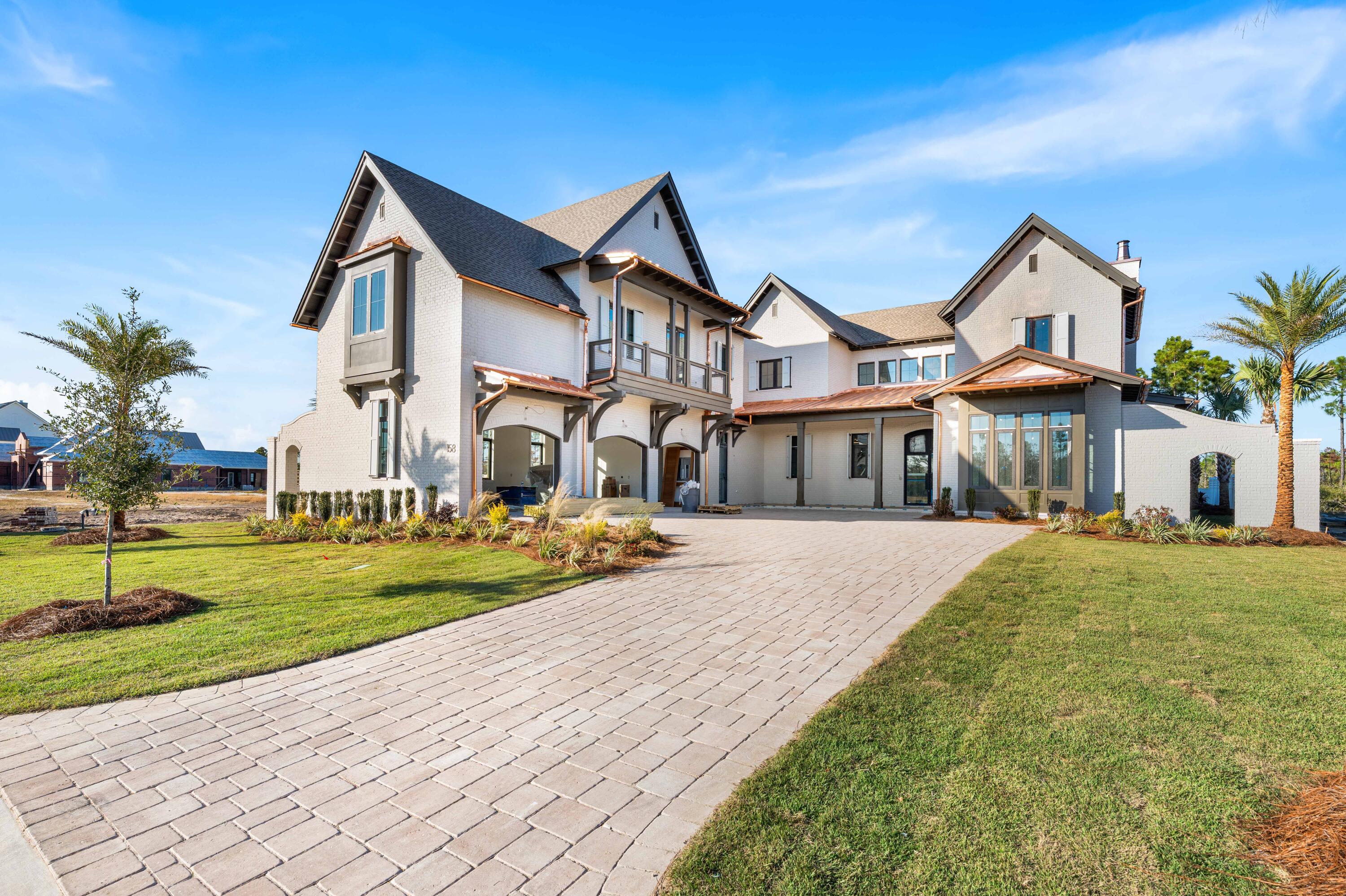 158 Sandcord Dr Inlet Beach Inlet Beach, FL 32461 - Photo 1 of 53 a front view of a house with a yard and porch