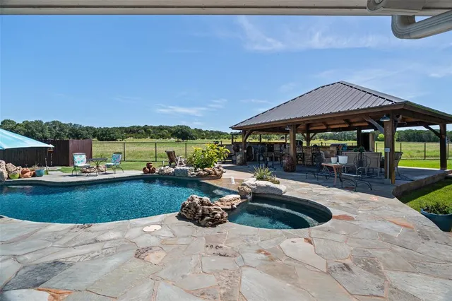 a view of a lake with cars parked