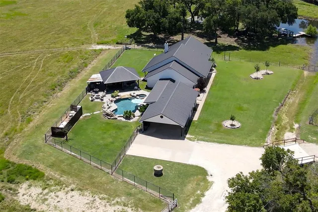 a view of a tables and chairs in a patio