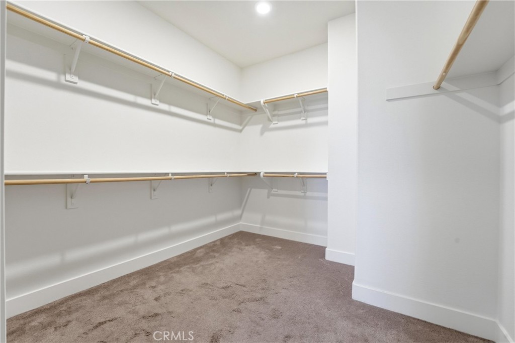 182 Scale Irvine, CA 92618 - Photo 34 of 61 A real walk in closet with double rod storage wrapping three walls. Bring everything.