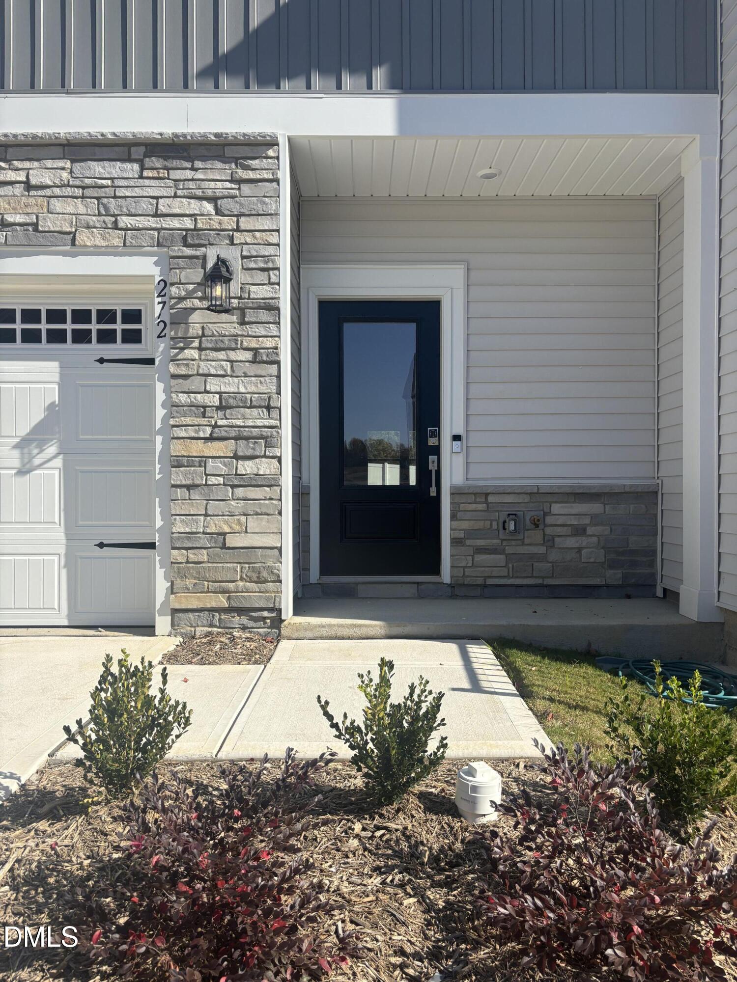 272 Hank Way Willow Spring, NC 27592 - Photo 4 of 19 a front view of a house with a yard