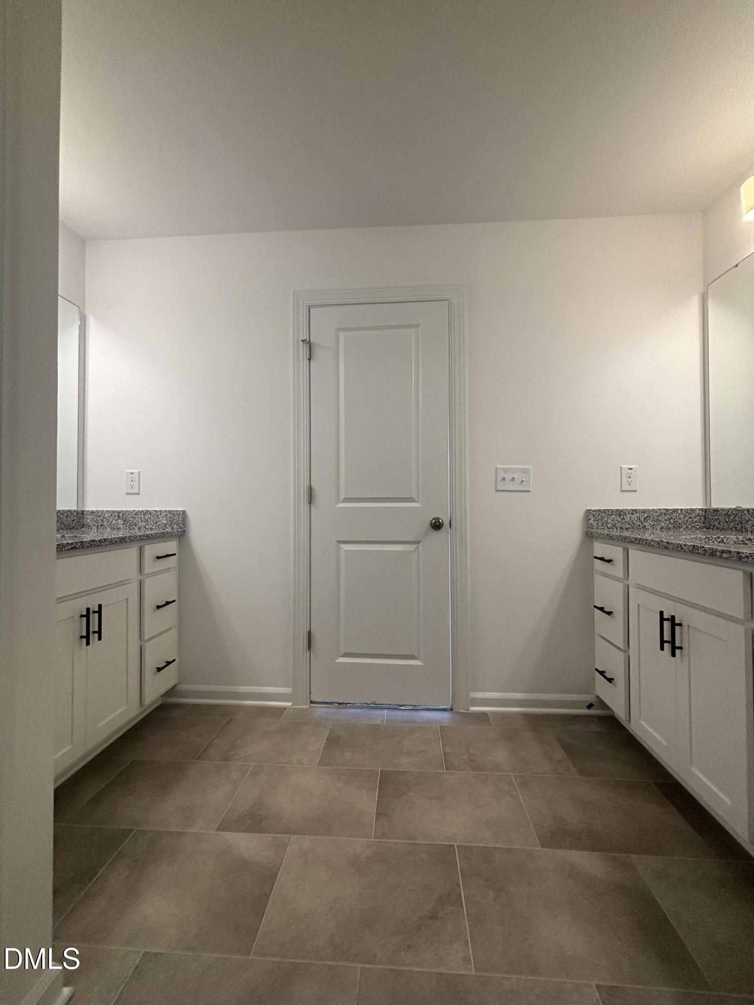 272 Hank Way Willow Spring, NC 27592 - Photo 10 of 19 a view of a kitchen with white cabinets