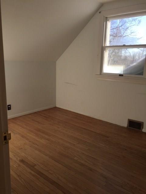 29 Madockawando Road Castine, ME 04421 - Photo 22 of 30 Small bedroom with wood floors