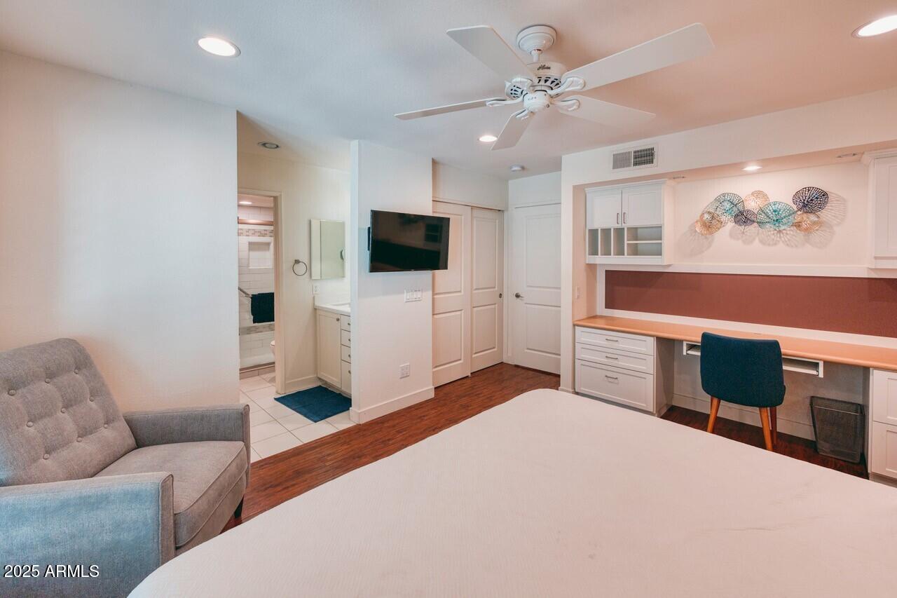 5221 North 24th Street, Unit 102 Phoenix, AZ 85016 - Photo 10 of 19 Featuring Ensuite & Large Workspace