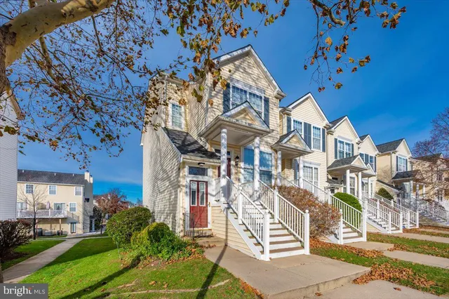 a view of a building with a yard