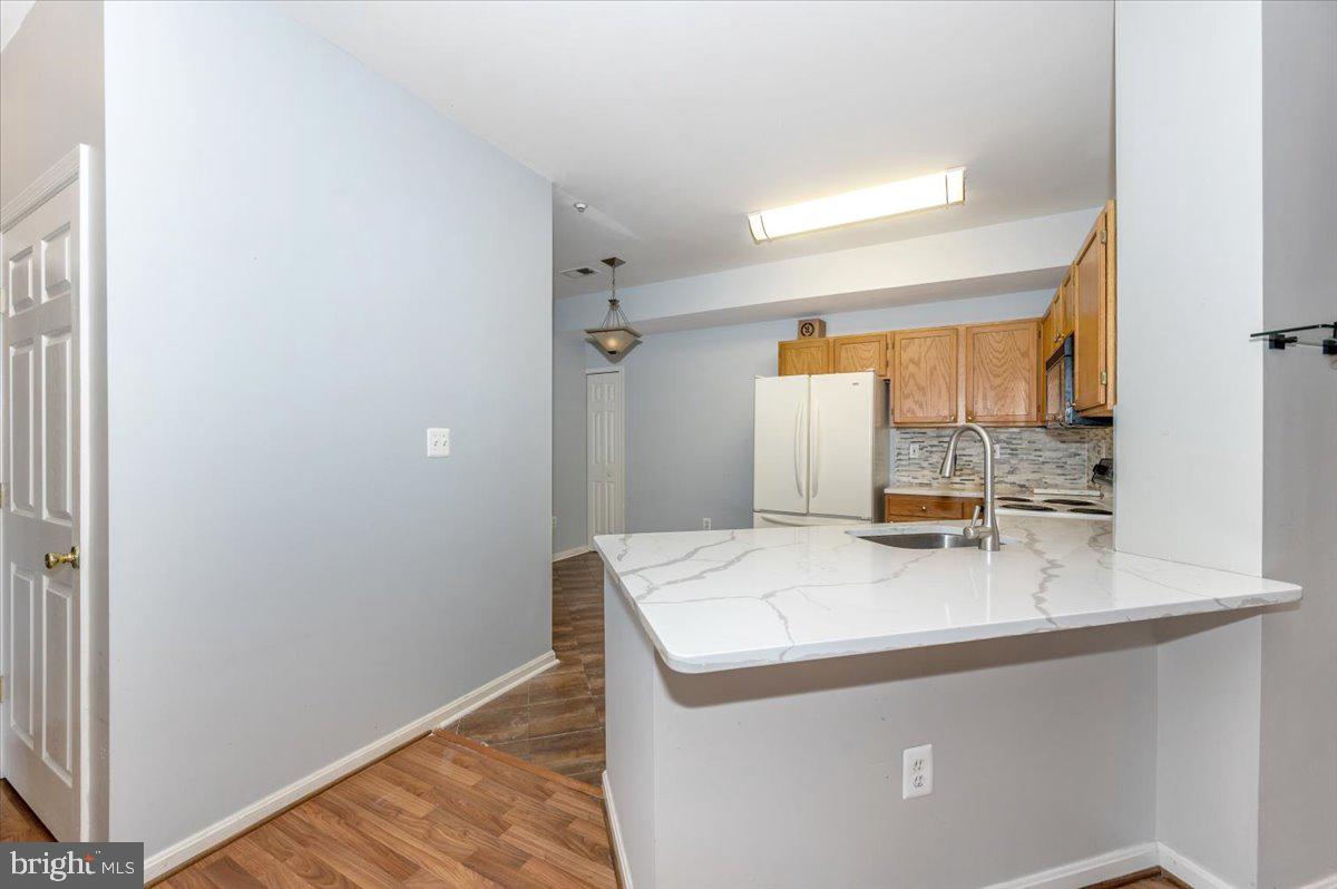 1683 Fallowfield Court Crofton, MD 21114 - Photo 11 of 36 a utility room with washer and dryer